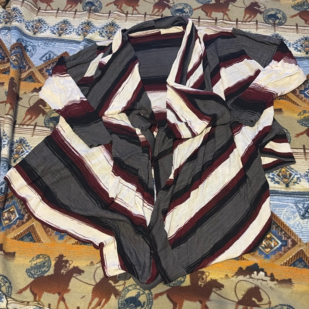 Pretty striped top , no size tag fits like xl